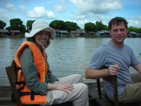 SGCP team leader Steve McNulty and Forest Service International Programs ecologist Beth Lebow tour Cambodia's Tonle Sap Lake.